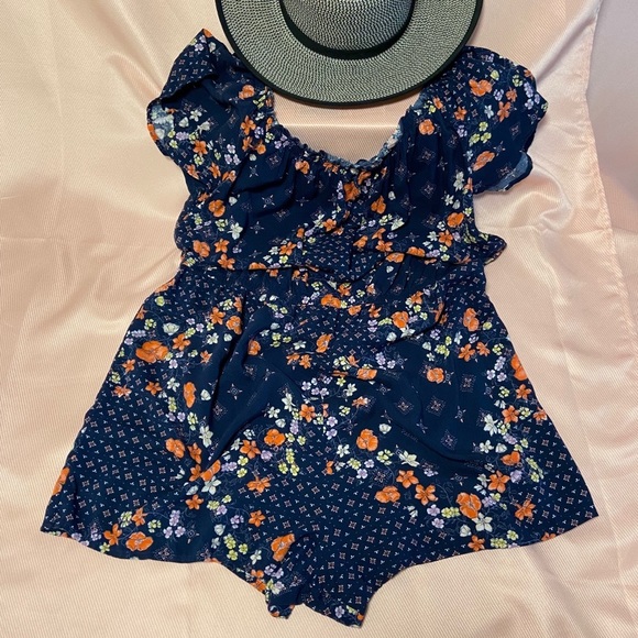 SO Other - SO’ Cute loose fitting navy blue / floral Romper.